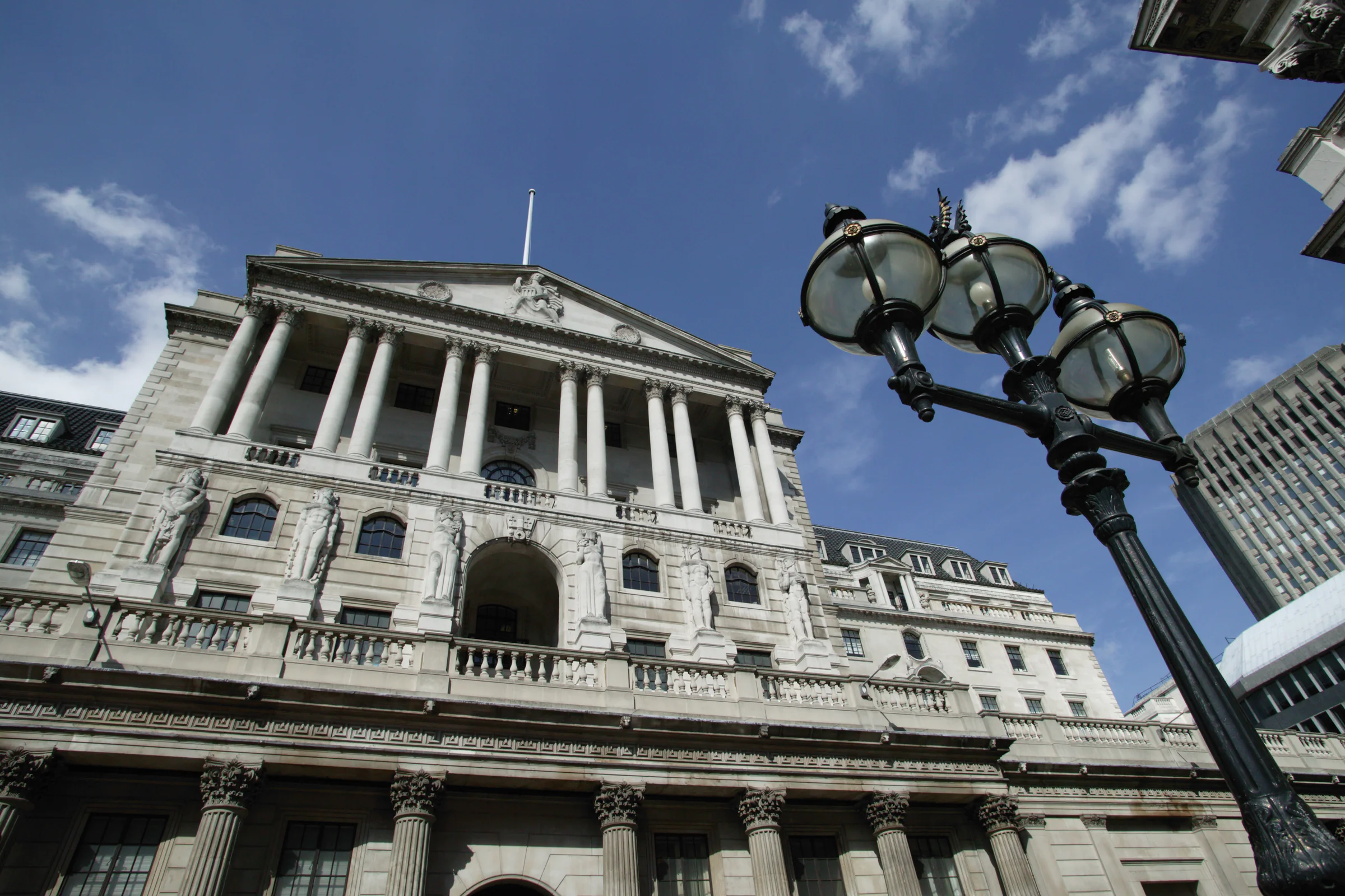 Bank of England exterior beneath a clear blue sky